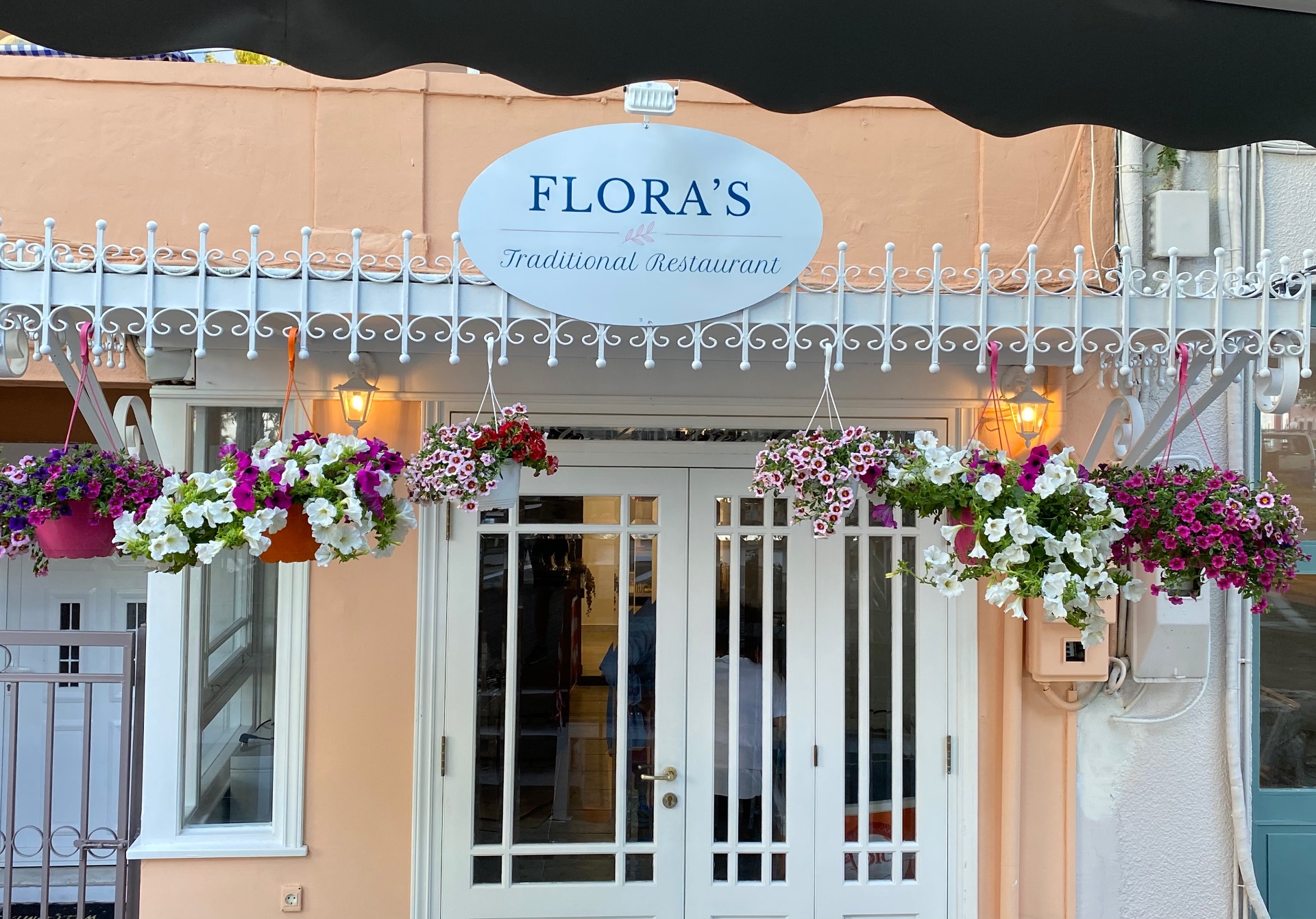 Flora's Restaurant entrance in Benitses